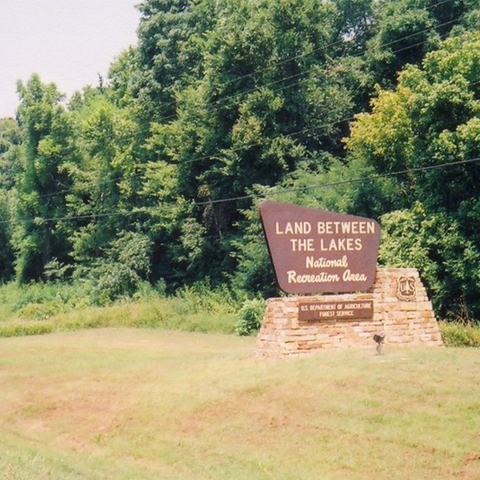 faded photo of the Land Between the Lakes sign