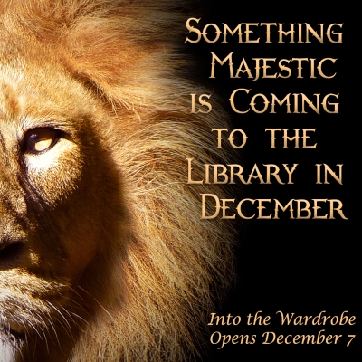 Close up of a lion with the words "Something majestic is coming to the library in December."