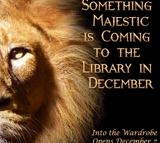 Close up of a lion with the words "Something majestic is coming to the library in December."